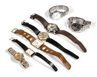 (7PC) MISC. WRISTWATCHES | Including: a Swiss Army stainless watch, Andes 17 Jewels, a Seiko Quartz watch, a Timex Indiglo, a Timex self-wind with a black band, an American Expedition trout-faced watch, and a faux Rolex with two-tone band.
