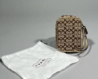 COACH PHONE WRISTLET | Small coach phone case/wallet with allover print. -  l. 3.5 x w. 1 x h. 5 in

