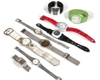 (9PC) GROUP WATCHES | Including a Met Museum hieroglyphic face watch, a Locman Italy Sport watch, a Schiaparelli Calendar watch, a lady's Casio, a Xanadu bracelet watch, a modern-style Alessi watch, a lady's Seiko, Calvin Klein, and a green Narmi watch [missing backplate]
