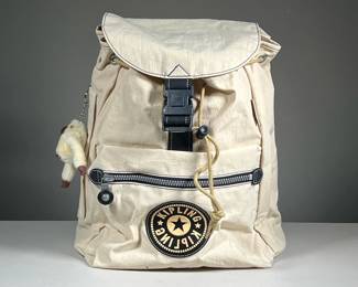 BRAND NEW WHITE KIPLING DRAWSTRING FLAP BACKPACK | Brand new with original tags. Featuring large main pocked with zipper on the side and smaller front pocket.

