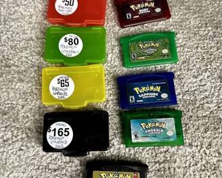 Very Desirable Gameboy Advance Pokemon Color Series Games from 2001 or 2002 Respectively, each sold with Mad Catz Protective Case. Pokemon Emerald (2002), $165. Pokemon FireRed (2001), $85. Pokemon Ruby (2002), $80. Pokemon Sapphire (2002), $80. Pokemon Leaf Green, (2001), $80. Pokemon "Gotta Catch 'Em All! Gold Version, $75 