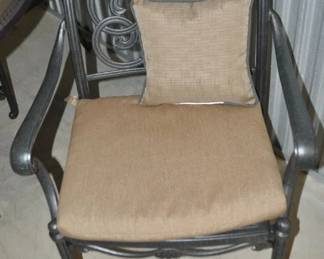 Another Up Close View of Two of these Brown Iron Outdoor Dining Arm Chairs Included in the Set 