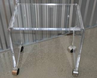 Mid-Century Waterfall Lucite Stool on Casters, W19” x H18.5” x D12” ($225) 