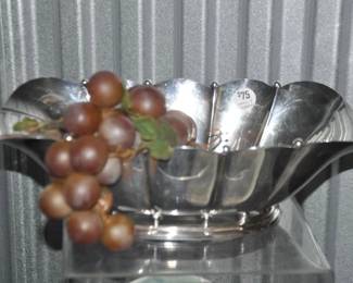 Vintage Reed & Barton Enhances Every Decor! This Rare Design Silver Plate Centerpiece Bowl Features Scalloped Top Edge and Intermittent Beads Along Top Edge Sides. The Elegant Beaded Design Carries to the Lower Portion of the Bowl with Beads Going Around the Base. Simply Stunning! Hallmarked on the Base and Numbered 1475, 15"W x 9.23"D x 4.5"H, ($75) 