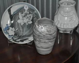 7 1/2” Marbleized Grey Vase Artist Signed M. Waller ($35) Shown with an Artist Signed 8” Glazed Ceramic Decorative Plate ($40) and a Jonathan Adler “Utopia Pleasantly Plump” Cream Stoneware Vase ($45) 