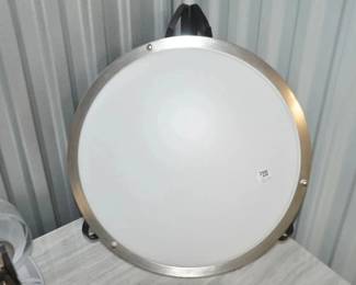 16" Flush Mounted Ceiling Fixture in Satin Silver and Frosted Molded Plastic, ($20). 