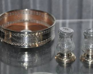 A Beautiful Vintage Kirk Stieff Silver Plate Wine Bottle Coaster Caddy ($25) Shown With 1 of 2 Sets of Quaker Hurricane NewPort Sterling Weighted Salt & Pepper Shakers with Etched Glass Embellishments. ($15/Pair) SOLD 