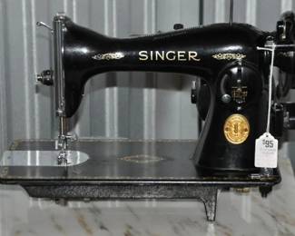 Vintage Singer Sewing Machine that is Classic and in Working Condition, Serial No. JC23151G, ($95). 