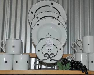 This Wonderful Swid Powell China Makes Such a Statement! Available is a 3 Piece Place Setting Including Dinner Plates, and Rimmed Soup Bowls, Service for 8 in the "Tuxedo Black" Pattern. As Is ($695). Also Shown are a Set of 8 Tuxedo Black Tall Coffee Mugs, Sold Separately