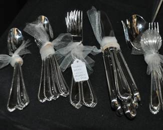 Classic Bead Glossy Stainless Steel Flatware by Lenox, 4 Piece Place Setting for 6 with Serving Pieces, ($95). 