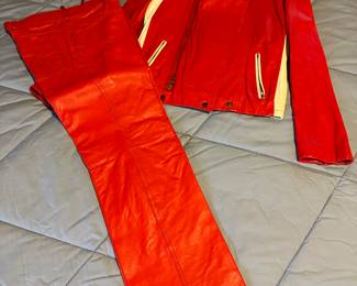 And who DOESN’T need red leather pants, and of course a matching jacket 