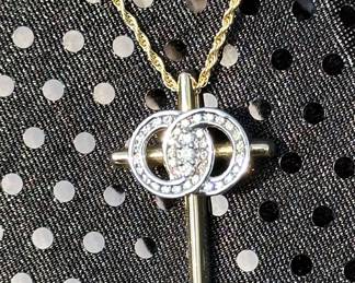 This beautiful necklace symbolizes forever love in marriage. 14k gold pendant on a fine 18” long 14k gold chain. 