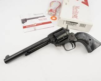 Make: Heritage
Model: Rough Rider
Caliber: .22 cal
Action: Semi
Barrel: 6
Bore: Shiny
Serial # 1BH406459
Condition: Excellent
These are fun for making tin cans dance in the backyard, plinking, or controlling pests and varmints around the farm. This Heritage Rough Rider features a 6â€ barrel chambered in .22LR, a six shot cylinder, an extra magnum cylinder, and fixed sights