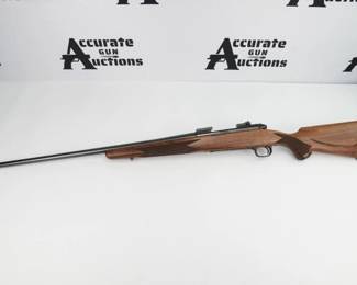 Make: Winchester
Model: 70
Caliber: 264 WIN MAG
Action: Bolt
Barrel: 26
Bore: Shiny
Serial # G175233
Condition: Excellent
Winchester Model 70 Walnut/Blued Bolt Action Rifle - 264 Winchester Magnum - Its highly polished, deeply-blued steel and finely checkered, fancy grain walnut stock with shadowline cheekpiece define the timeless grace and elegance of the Model 70. A one-piece steel bottom metal adds extra rigidity to the Super Grade’s stock and action for improved accuracy. The Super Grade’s shadowline cheekpiece is beautifully functional, placing your eye in perfect alignment with the scope. The rifle is in excellent condition and shows minimal signs of use and wear. 