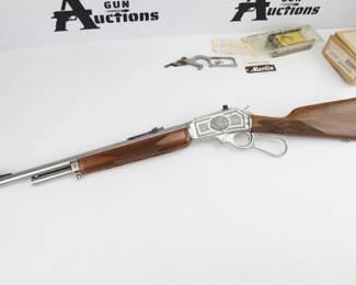 Make: Marlin
Model: 1895GS
Caliber: .45-70
Action: Lever
Barrel: 18
Bore: Shiny
Serial # 95GST210
Condition: Excellent
Offering this “1 of 500” Marlin 1895GS Talo. The unique serial number, 95GST210, would indicate this model was produced in 2005 and released in 2007. This beautiful 1895GS Talo is a .45-70 Stainless lever action rifle and has Ulrich inspired engraving from patterns produced by Marlin in the late 1890’s . It features majestic and highly ornamental whitetails on one side of the receiver and the Marlin mounted cowboy logo on the other. With beautiful engraving, Wild West Guns trigger and ejector, DRC lever, and improved Limbsaver recoil pad, this custom rifle is a must have! This Marlin has it all, checkered grip and forearm, rubber recoil pad, sling stud mounts, hooded post front sight, and a Skinner “Express” peep rear sight. Comes in the original box with paperwork, and includes the original parts and custom work information. 