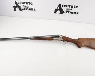 Make: REMINGTON
Model: SPR 210
Caliber: 12GA
Action: Break
Barrel: 26.5
Bore: Shiny
Serial # 0763284R
Condition: Excellent
This is a used Remington Baikal SPR 210 12 gauge break open side by side shot gun. It is a 2 shot with a 28 1/2" blued barrel. The shotgun has an engraved receiver and is in excellent condition, showing minimal signs of use and wear. 
