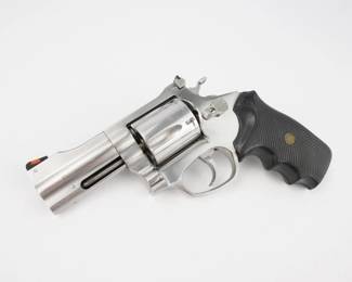 Make: ROSSI
Model: 720
Caliber: .44 S&W SPL
Action: DA
Bore: Shiny
Serial # AB156720
Condition: Excellent
The Rossi 720 is a .44 Smith & Wesson Magnum revolver known for its reliable performance and robust construction. Featuring a 6-round cylinder capacity, this firearm boasts a sturdy stainless-steel frame and barrel, contributing to its durability and resistance to corrosion. The revolver incorporates a double-action firing mechanism, providing smooth and consistent trigger pulls. The fixed front sight and adjustable rear sight enhance accuracy, making it suitable for various shooting applications. Has rubber grips. 