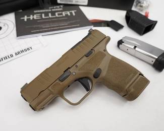 Make: Springfield Armory
Model: Hellcat
Caliber: 9x19
Action: Semi
Barrel: 3.25
Bore: Shiny
Serial # BB548205
Condition: Excellent
Designed with carry in mind, the Springfield Armory Hellcat 9mm Micro-Compact 13-Round Pistol boasts best-in-class capacity with included 11+1 and 13+1 magazines. The Hellcat also features Adaptive Grip Texture that provides a positive grip without irritating your skin or putting undue wear on clothes. Reversible magazine release to accommodate left-handed users. The pistol, dressed in FDE, is new in the box and comes with 2 magazines, soft case, and speed loader. 