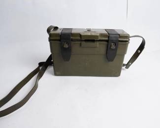 ake: German artifact
Model: Post WWII Illuminator
Post WWII scope illuminator in unknown working condition. All pieces show handling wear. Green plastic case shows handling wear.