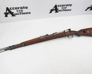 Make: Werke AG
Model: 98
Caliber: 8mm Mauser
Action: Bolt
Barrel: 24
Bore: Shootable
Serial # 5947
Condition: Excellent
243 1939-Mauser Werke AG, Borsigwalde, serial number 5947 match on barrel and action, Replacement bolt (no number) but all the small parts of bolt match with serial number 4764. Quanity produced 237,661, Firing Proofs, Weimar Eagles (early) production Waffenamts with Wiemar Eagles (early production. Milled parts consist of upper/lower bands, trigger guard, floor plate, and follower. Stock is in excellent condition, barrel has strong lands and grooves, metal finish is warn. Considering the age and year of manufacture this rifle is in great condition.