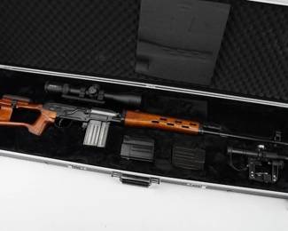 A scarce Chinese-made commercial version of the Russian SVD Dragunov sniper rifle chambered for the 7.62x51 NATO cartridge. Hooded post and tangent rear sights with the Norinco factory markings on the right side of the milled receiver. This rifle comes with the original scope and display case.