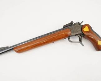 Make: THOMPSON CENTER
Model: SUPER 14
Caliber: .22 LR
Action: Break
Bore: Shiny
Serial # 420163
Condition: Excellent
The Super 14 Contender is the most recognizable single-shot pistol produced by Thompson/Center Arms. The Thompson/Centre single-shot pistol has been in existence since the late 1960s and has proved a very successful design. It has been made available in almost every possible caliber at various times. This Super 14 is chambered in .22 lr and features custom wood working on the grips. The pistol is in excellent condition, showing normal signs of use and wear.