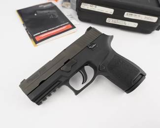 Make: Sig Sauer
Model: P250
Caliber: .40S&W
Action: Semi
Bore: Shiny
Serial # EAK043176
Condition: Excellent
The SIG Sauer P250 is a semi-automatic pistol made by Sigarms (now known as Sig Sauer Inc. of Exeter, New Hampshire). Introduced in 2007, the hammer-fired P250 is chambered in .40 S&W and comes with a case and one magazine. The pistol is in excellent condition, showing normal signs of use and wear. 