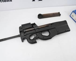 Chambered in the 5.7x28mm cartridge, the FN PS90 utilizes blowback operation and fires from a closed bolt for greater accuracy and reliability. The FN PS90’s civilian legal 16.04? cold hammer-forged MIL-SPEC barrel is equipped with an integrated muzzle brake to reduce recoil. Dual magazine latches, cocking handles and an innovative synthetic thumbhole stock with a molded-in sling attachment point help make the FN PS90 fully ambidextrous. The firearm is in like new condition and comes with the factory box and two magazines.
