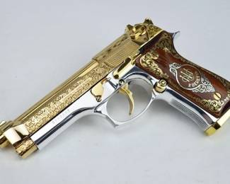 Make: Beretta
Model: 92F
Caliber: 9mm Para
Action: Semi
Barrel: 4.5
Bore: Shiny
Serial # D29280Z
Condition: Excellent
The 92FS is a double/single-action semi auto pistol that employs an open-slide, short-recoil delayed locking-block system, which yields a faster cycle time and delivers exceptional accuracy and reliability. In particular, the open-slide design practically eliminates “stove-piping” and helps flawless cycling and feeding even after thousands and thousands of rounds. This stunning representation is finished in two tone, with a nickel plated frame and a gold-tone, engraved barrel and slide. The wooden grips are also laced with a golden pattern. The pistol is in excellent condition, showing minimal signs of use and wear and comes with one magazine. 