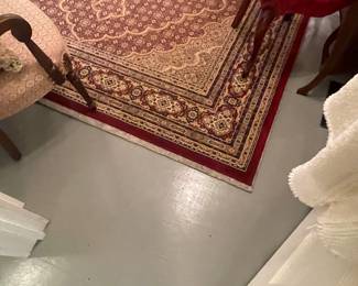 5’x8’ oriental rug in 1st bedroom on the right
