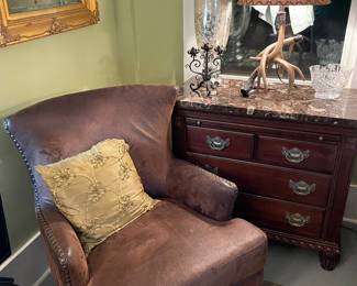 The other Kincaid mahogany chest with leather upholstered armchair