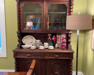 Wonderful English oak cupboard with carved game bird panels