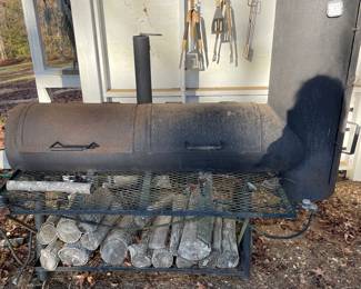 Outdoor kitchen featuring a smoker/ grill