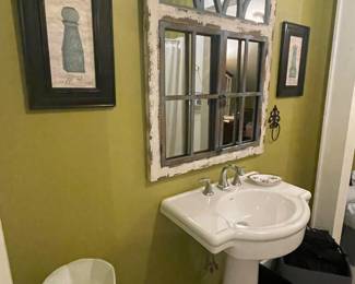Last bath on the left with distressed mirror