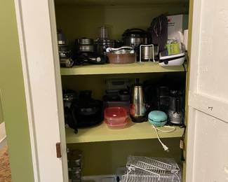 Small appliance closet in hall off kitchen