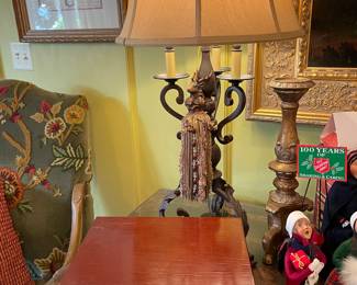 Mahogany humidor with one of a pair of wrought iron lamps