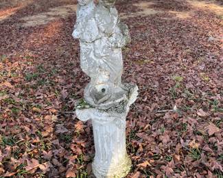 Old concrete fountain on old concrete column pedestal