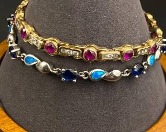 Two sterling bracelets Ruby and opals