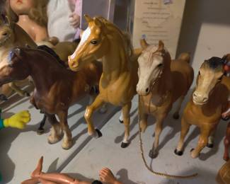 Numerous vintage toy horses