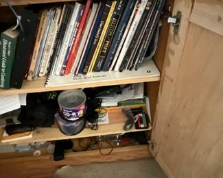 Cabinet full of books & computer equipment & accessories 