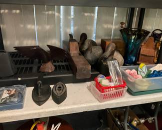 Duck decoys & other items , vintage irons, eagle in wood & metal, cow bell