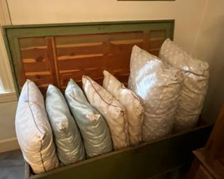 Cedar chest open with pillows