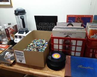 Vinyl records are in the basement, next to marbles and a blender.  Be advised, if you put marbles in the blender, you will be banned from future sales, just sayin'.