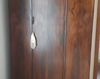 One fine wardrobe, with plenty of room for all the things that keep you from facing public nudity charges.  Nudists keep scrolling.