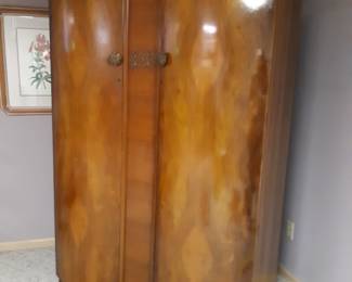 Basement armoire does not have its original guts.  It is priced accordingly. 