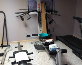 Cross Bar home gym by Weider. Basement. 