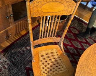 #8 - $350 - Round oak table with four chairs 2 need re caned or put a pillow on top - 45"D round + 1 leave for oval 