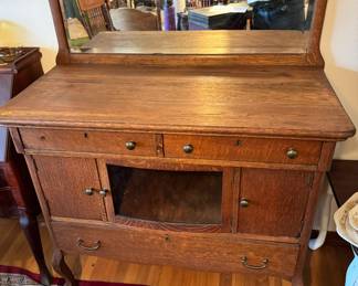 #10 - $400 Tiger oak buffet/server with center glass door 41Wx20Dx39T
