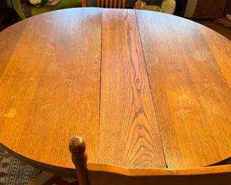 #8 - $350 - Round oak table with four chairs 2 need re caned or put a pillow on top - 45"D round + 1 leave for oval 