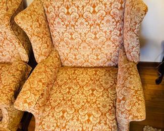 #4 - $200 Pair of orange wing back chairs 